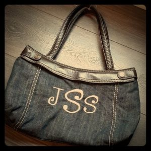 Thirty-one skirt purse with monogram denim skirt